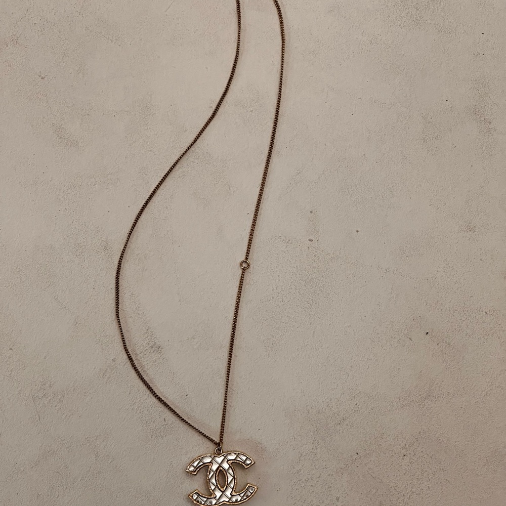 CHANEL Gold Necklace with Elegant Pendant